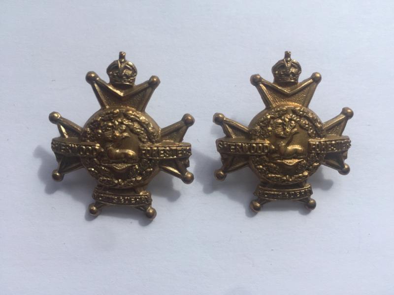 Sherwood Foresters Collar Badges.