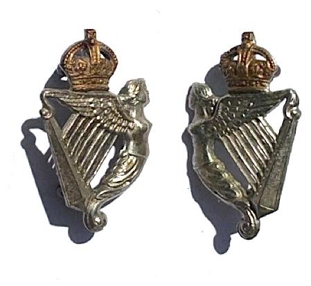 A pair of 8th Royal Irish Hussars collar badges.