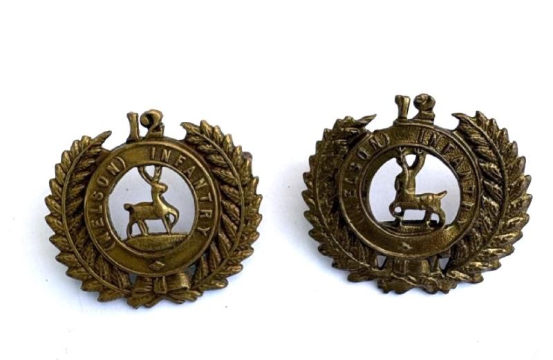 New Zealand: Pair of12th Nelson Infantry Collar badges with Gaunt tabs