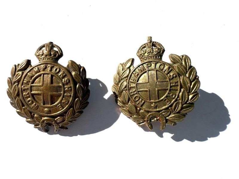 An unmatching pair of Northamptonshire Collar Badges